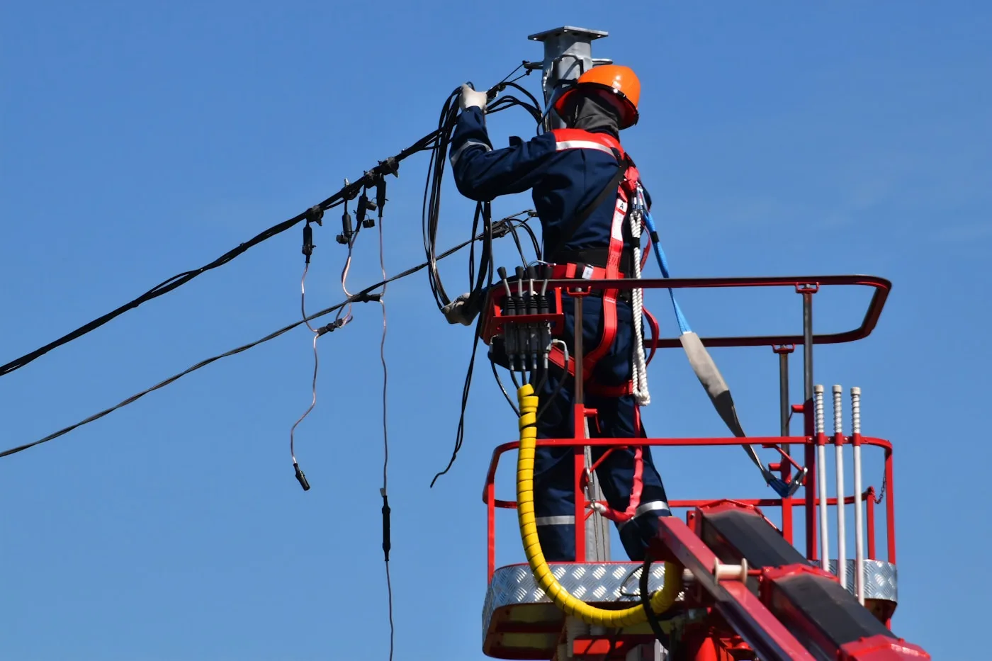 Electrician at work — panel, outage, and service calls qualified before dispatch
